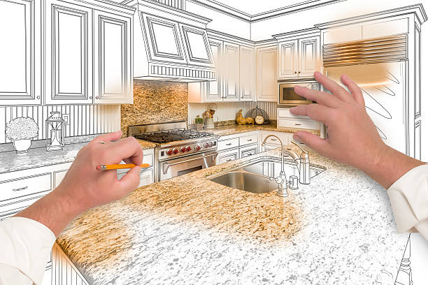 istock Male Hands Sketching Custom Kitchen with Photo Showing Through 508514080