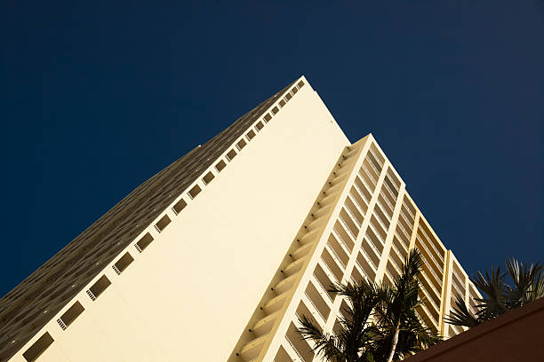 istock Modern high rise condominium with palm trees 508514842