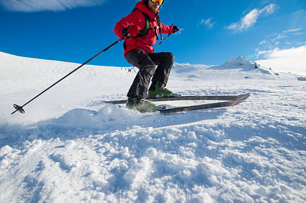 istock Skier turning on a blue sky day 508514885