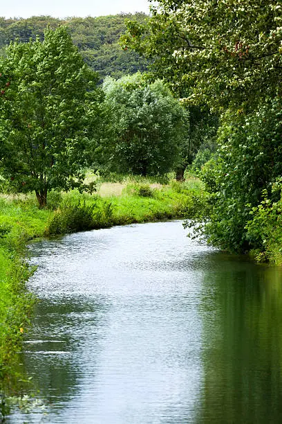 Small river Wetering close to Kleve at Niederrhein in summer, Germany