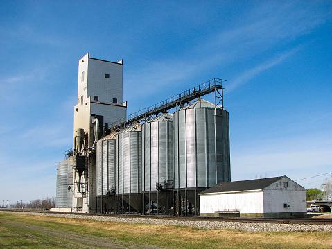 Grain Elevator and Bins with Blue Sky