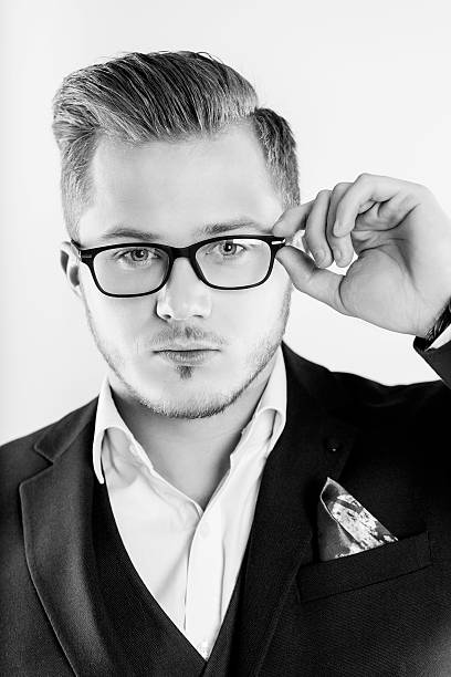 istock Stylish handsome. Confident young businessman adjusting his eyew 508523008