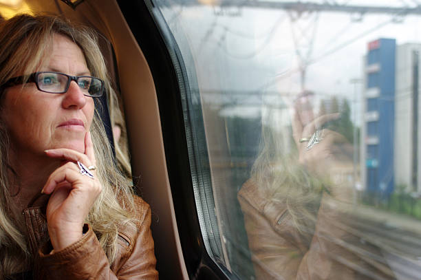 istock Woman sitting in a train 508523720