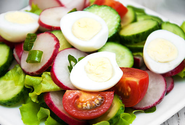 istock Spring salad with eggs, cucumbers and radish 508523866