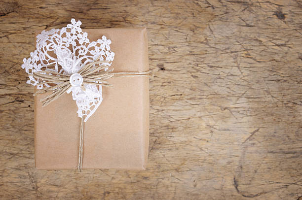 istock Wrapping eco gift packages with brown paper and string 508524910