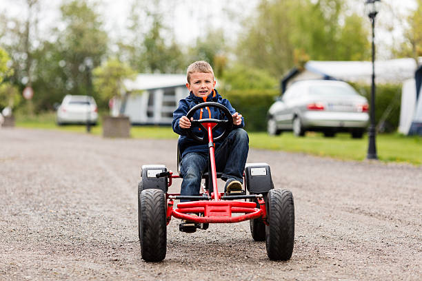 istock Boy driving on buggy cart 508524938