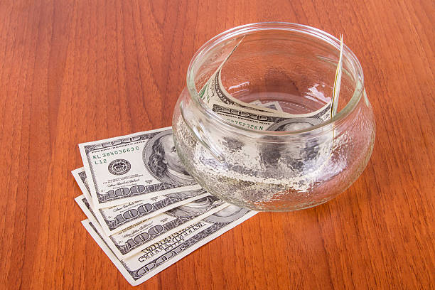 istock Dollar Banknotes in Glass Bowl 508546863