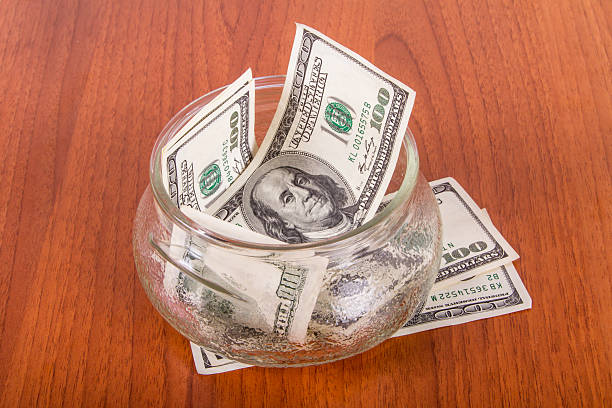 istock Dollar Banknotes in Glass Bowl 508546865