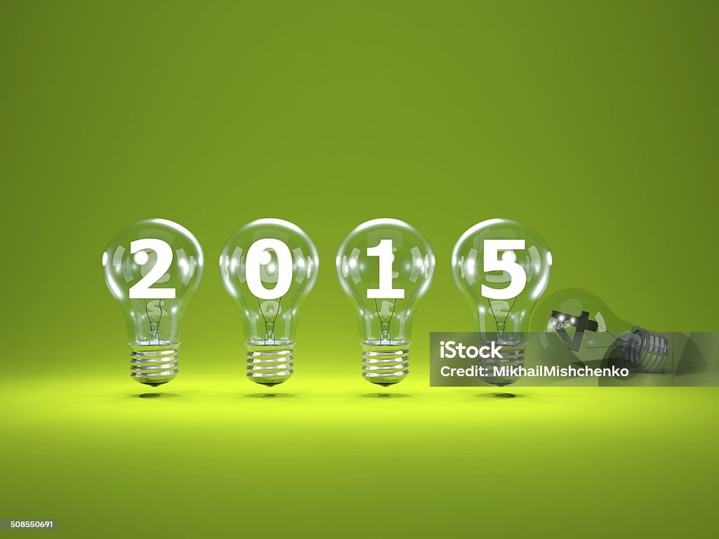 2015 New Year sign inside light bulbs 2015 New Year sign inside light bulbs on green background 2015 Stock Photo