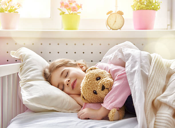 istock girl sleeping in the bed 508554620