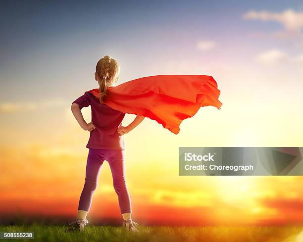 Girl Plays Superhero Stock Photo - Download Image Now - Heroes, Child, Heroines