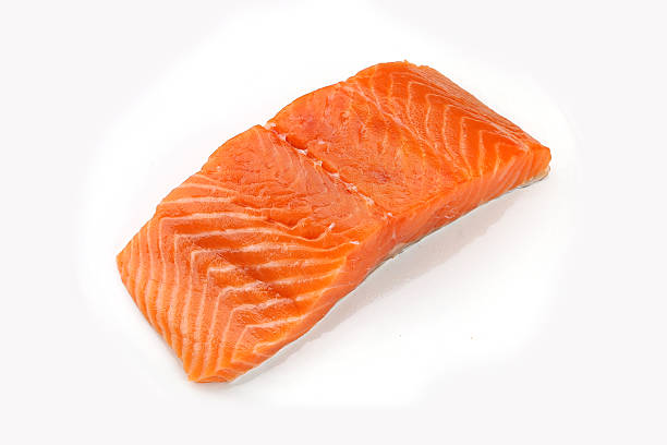 istock salmon steak red fish on white background 508575692