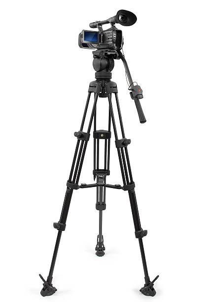 Production Video Camera on a Tripod production camera on a tripod and isolated on white background tripod stock pictures, royalty-free photos & images