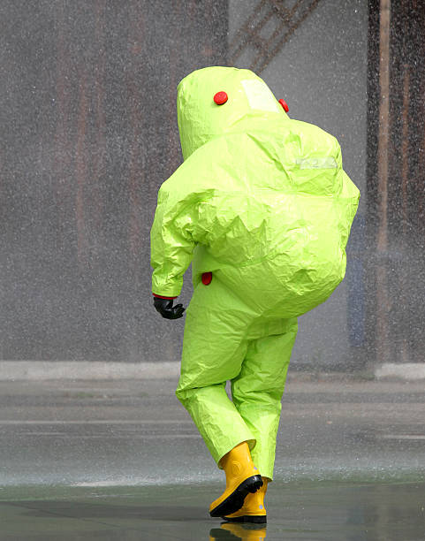 istock man with the jumpsuit for the biohazard 508576385