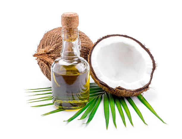 ココナッツオイルを代替療法 - aromatherapy oil massage oil alternative therapy massaging ストックフォトと画像