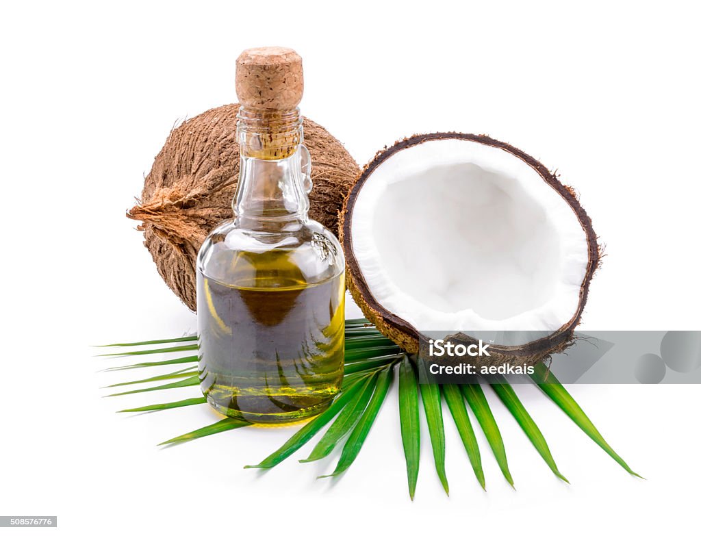 Coconut oil for alternative therapy Coconut oil for alternative therapy on white backgroung. Alternative Medicine Stock Photo