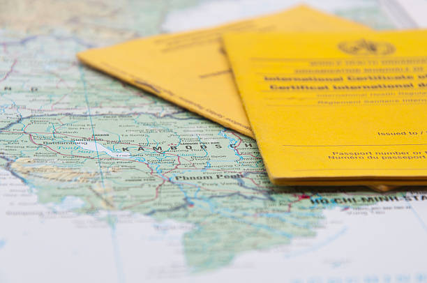 istock Close Up of Vaccination Certificate and world map. 508576994