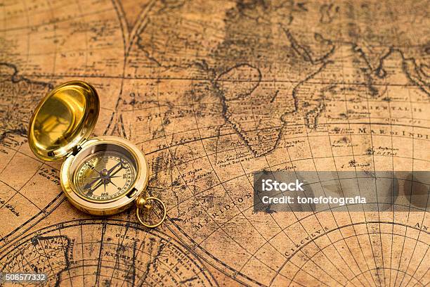 Old Compass On Vintage Map Stock Photo - Download Image Now - Map, History, Navigational Compass