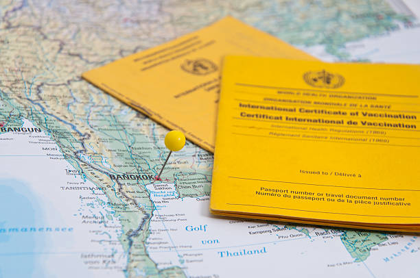 istock Close Up of Vaccination Certificate and world map. 508577338