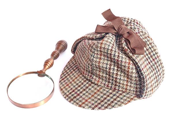 istock Deerstalker Cap and Vintage Magnifying Glass 508578385