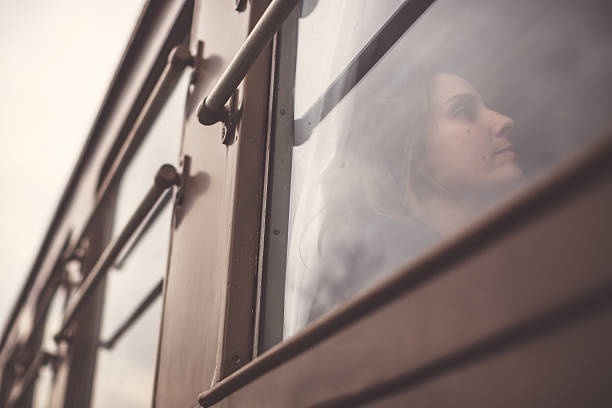 istock Woman travelling alone in a train 508578508