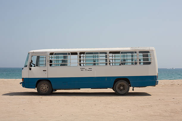istock An empty school bus parked on the sand, Dibba, Oman 508578619