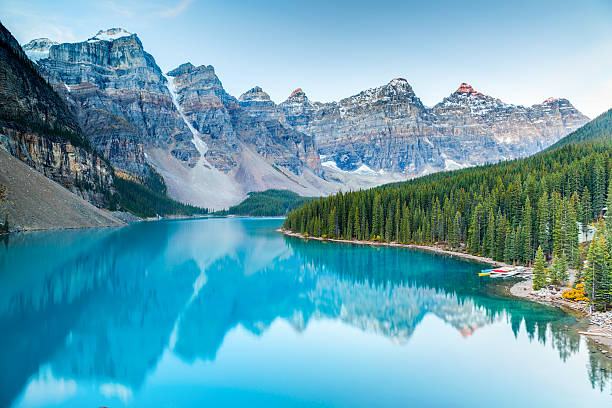 Sunrise at Moraine lake Moraine lake in Banff National Park, Alberta, Canada moraine lake stock pictures, royalty-free photos & images