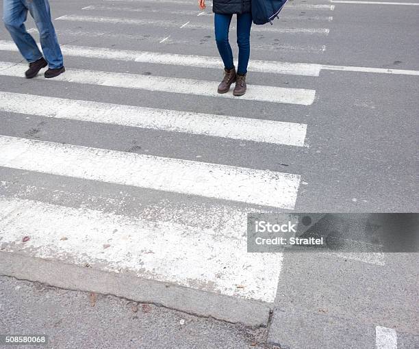 Man In Jeans Walking Across A Zebra Crossing Stock Photo - Download Image  Now - Crosswalk, Zebra Crossing, Crossing - iStock