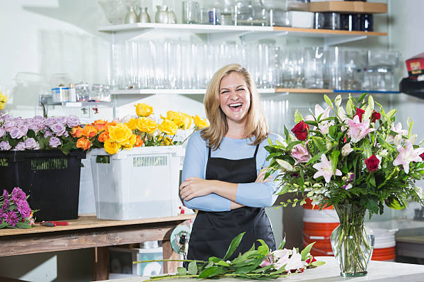 istock Florist working on flower arrangements 508580222