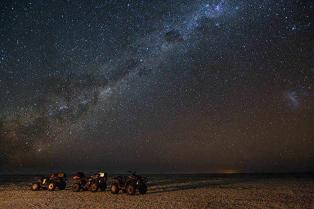 Quad bikes under a gallaxy stock photo