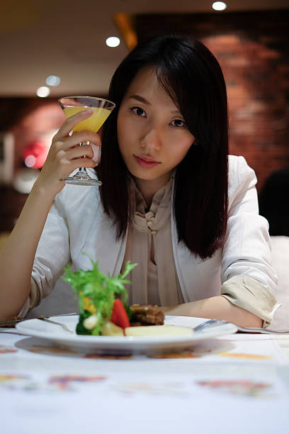 istock asian businesswomen eat dinner in a restaurant. 508583341