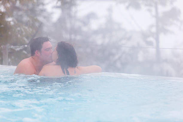 istock Couple Kissing in a Thermal Bath 508583719