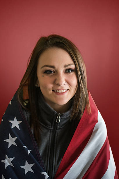 Young athlete wrapped in American Flag