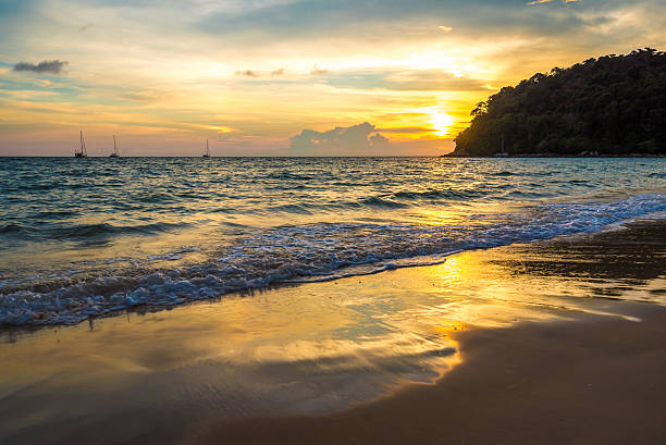 istock Wave at the beach under sunset. 508585818