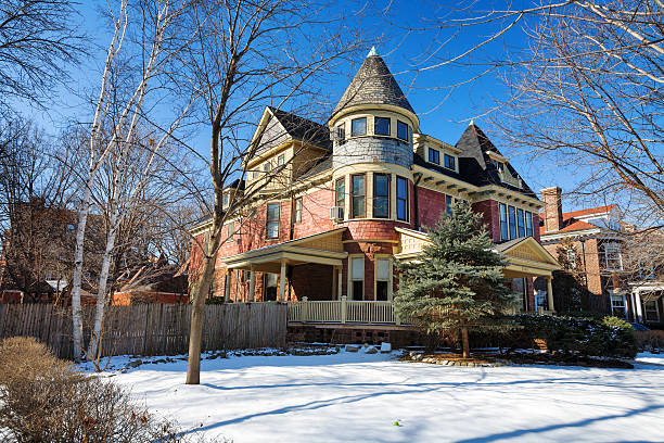 Chicago, USA - February 10, 2007: Queen Anne stye mansion in Hyde Park, a Chicago community on the South Side. Victorian house in winter. No people.