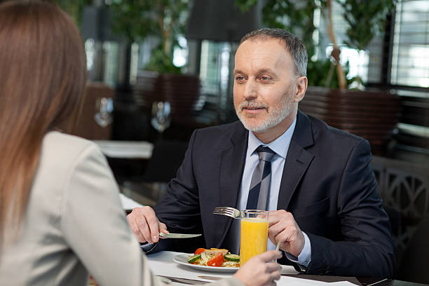 istock Successful business partners have a lunch in cafe 508587694