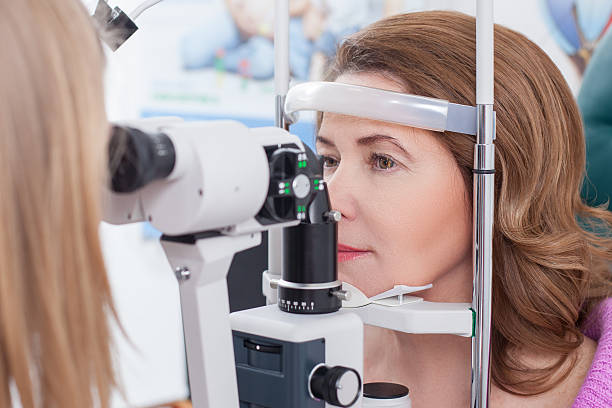 istock Middle aged lady is visiting oculist in clinic 508588428