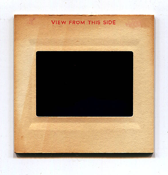 Blank vintage Slide isolated on white with 2 clipping paths (inside and outside of frame) excluding the shadows