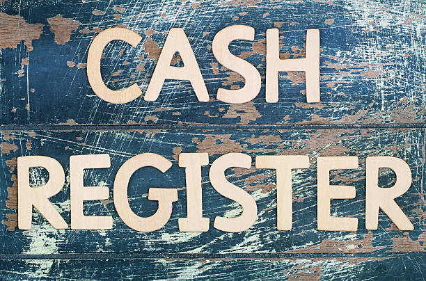istock Cash register written with wooden letters on rustic surface 508589470
