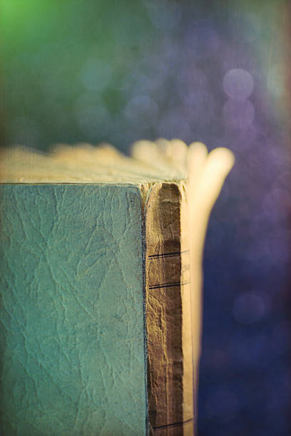 istock Digital art, grunge textured composition, Macro of old blue book 508590986