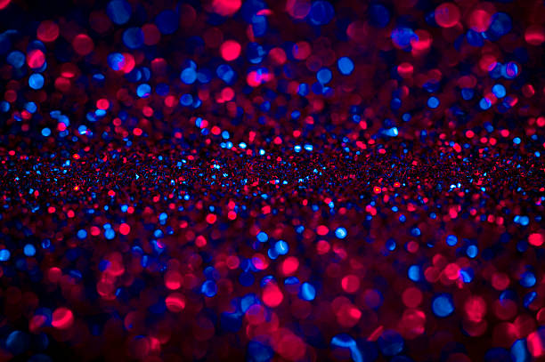 istock Red and dark blue defocused glitter background. 508591698