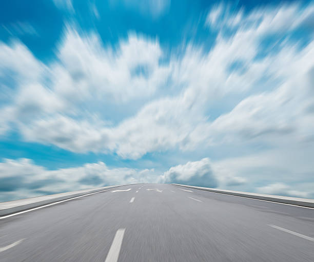 istock high way blue sky to Travel Destination journey 508605409