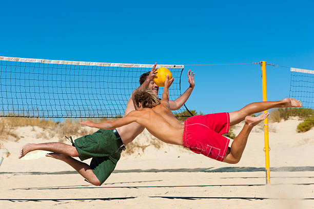 istock Friends playing beach volleyball 508606125