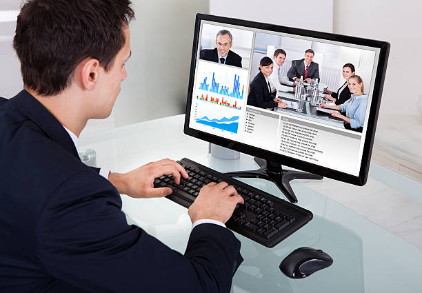 istock Businessman Video Conferencing With Team In Office 508606583