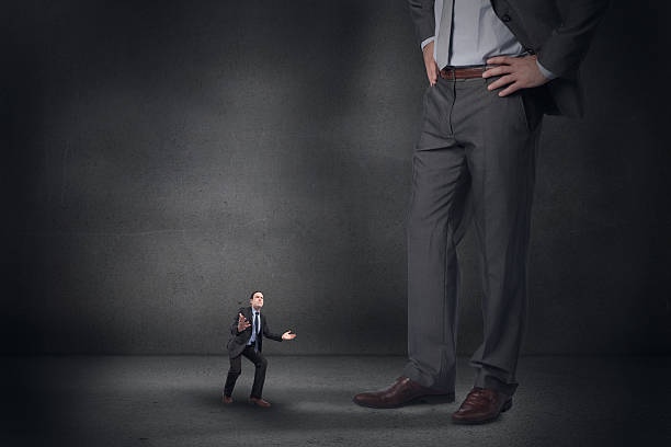 istock Businessman posing with arms outstretched and giant 508607621