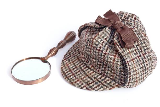 istock Deerstalker Cap and Vintage Magnifying Glass 508608775