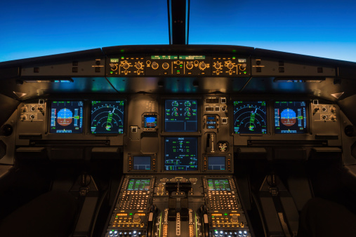 Cockpit view of a commercial jet aircraft cruising at flight level 360.