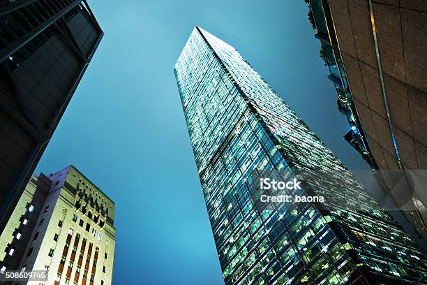 Corporate Buildings Stock Photo - Download Image Now - Directly Below, Night, Office Building Exterior