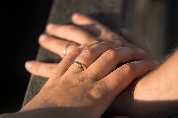 istock Affectionate touch. Hands of married couple holding hands 508610121