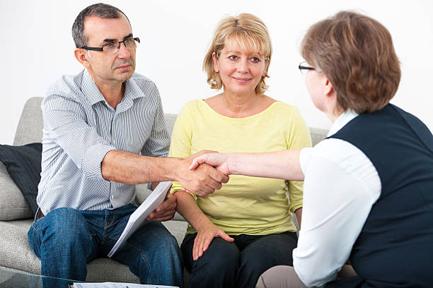 istock Couple talking with financial advisor 508610605